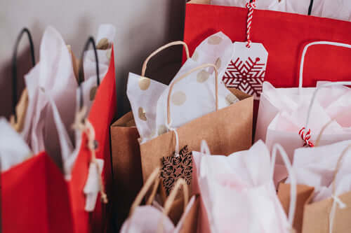 Paper bags filled with party favors