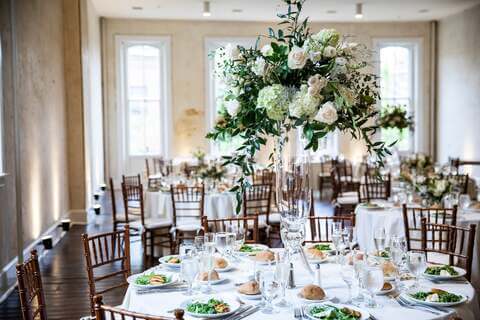 Tall white flower stand centerpiece